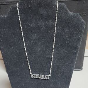The scarlet tour necklace.